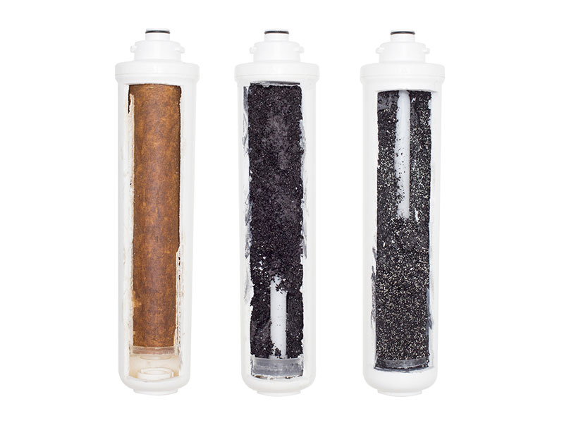 Used water cartridges in section on a white background