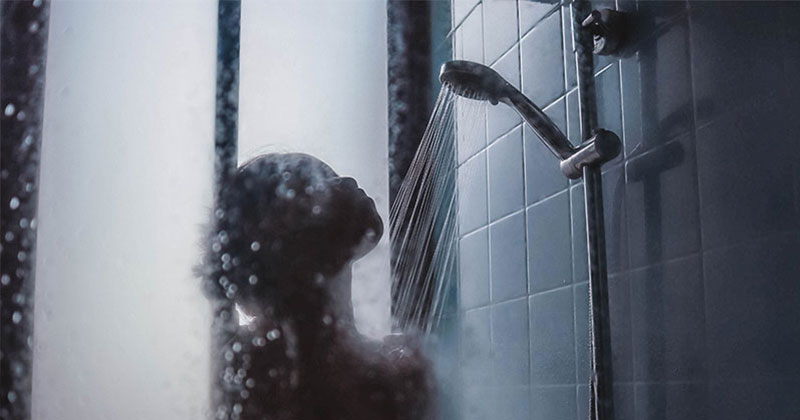 silhouette of woman in shower