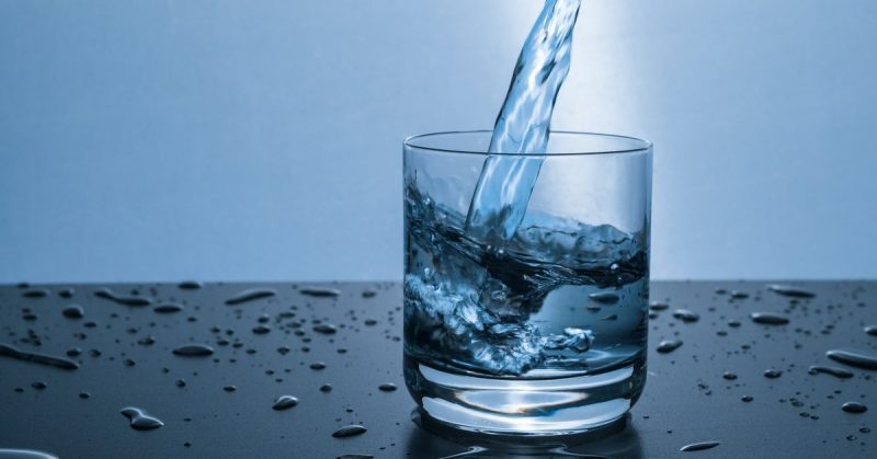 water pouring into glass cleancoolwater.com